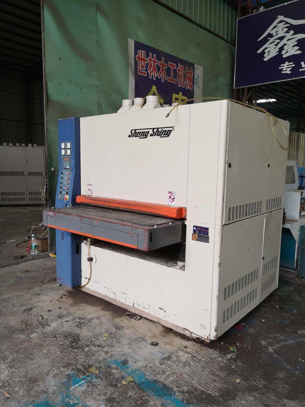 振蕭三帶砂光機